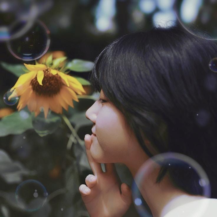 Kaveri Mehta, Lead Design Curator at StudioHavenLink, reviewing corporate floral arrangements